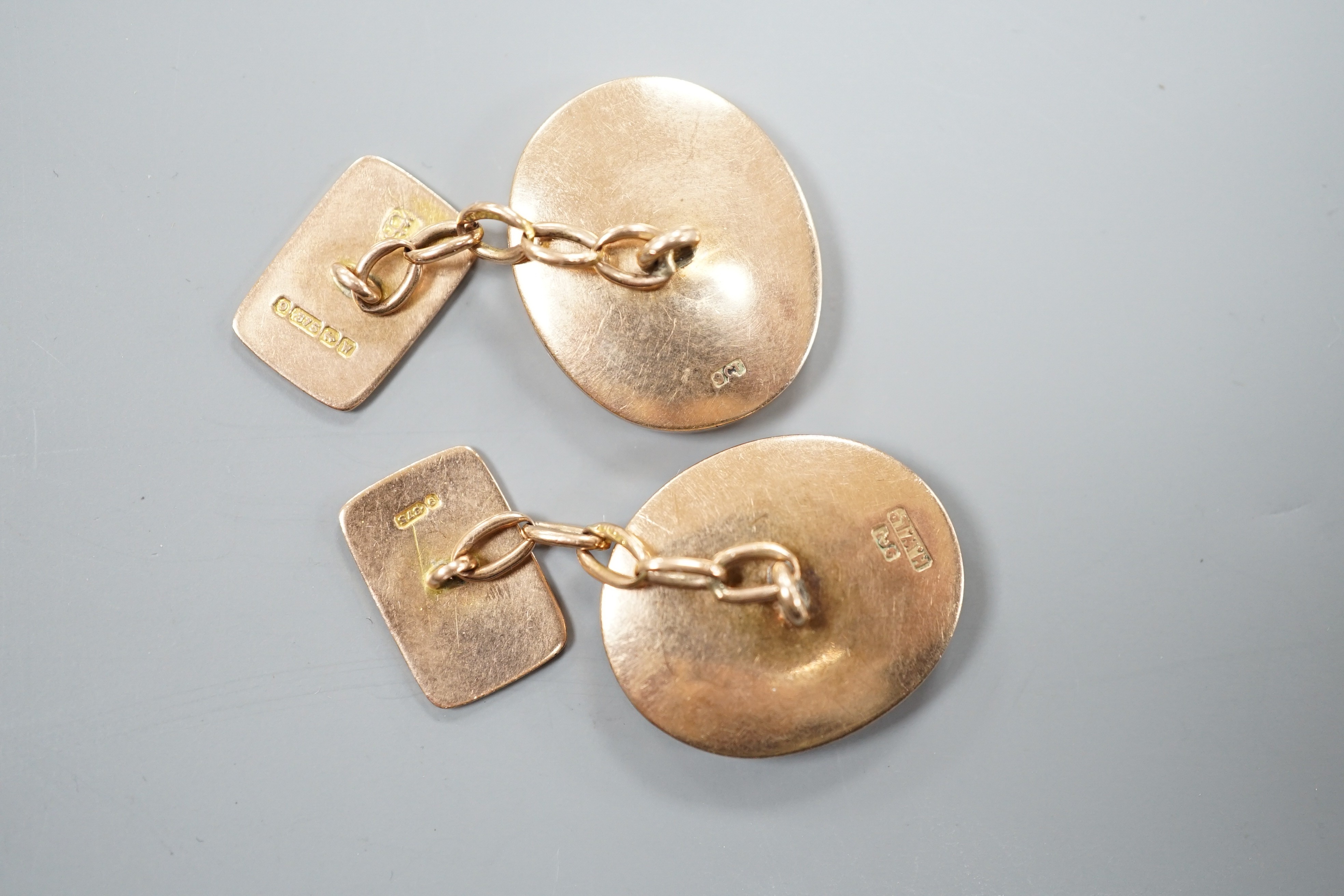 A pair of 9ct and oval bloodstone set cufflinks, 22mm, gross weight 10.4 grams.